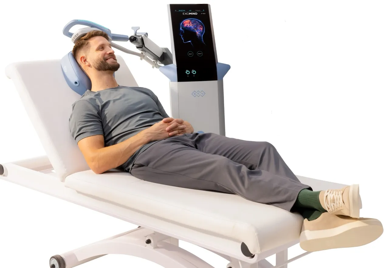 Patient receiving EXOMIND transcranial magnetic stimulation